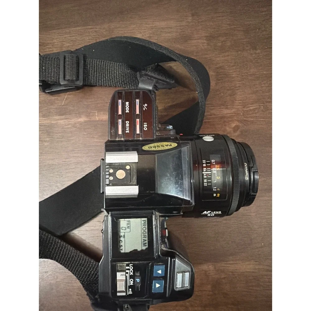 Minolta Maxxum 7000 AF 35mm SLR Camera with 50mm and Sigma 60-200mm Lense Manual